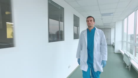 Doctor-walking-corridor.-Steadyshot-of-medical-worker-in-laboratory-corridor