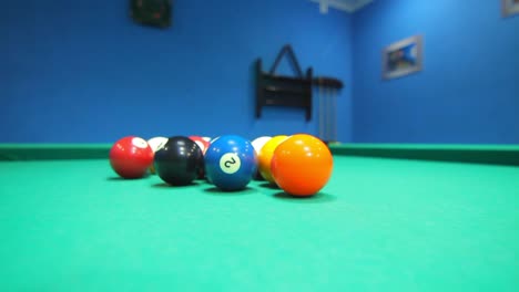 Colorful-billiard-balls-on-pool-table.-Game-process.-Billiards-game-starting