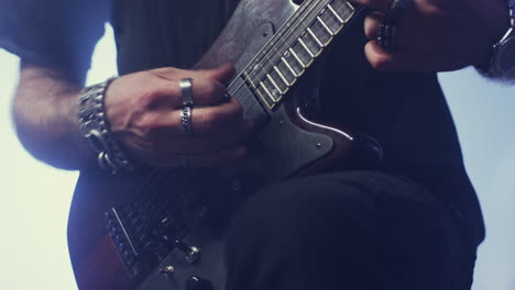 Rock-guitar-player-playing-music.-Guitarist-play-rock-music