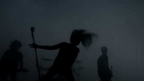 Rock-band-performing-concert.-Rock-music-concert.-Music-group-silhouette