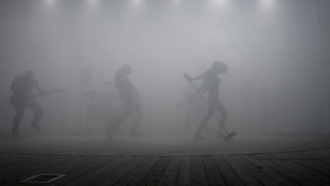 Rock-music-concert-stage.-Alternative-music-group-silhouettes-in-strobe-light