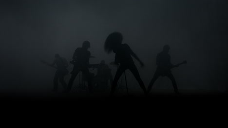 Rock-music-concert.-Rock-group-silhouette-performing-on-music-concert