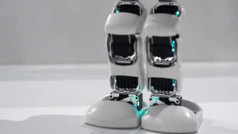 Robot-doing-squat-exercise.-Squat-robot-foot.-High-technology-concept