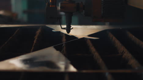 Industrial-welding-laser-machine-cut-steel-sheet.-Programmed-plasma-cutting