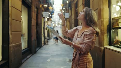 Side-view-of-focused-woman-looking-map-outdoor.-Tourist-woman-searching-address