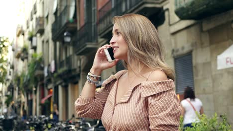 Portrait-of-smiling-woman-talking-mobile-phone.-Close-up-pretty-girl-making-call
