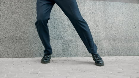 Closeup-man-feet-dancing-outside.-Cropped-image-man-in-shoes-dancing-at-street