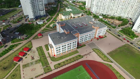 Sports-stadium-in-schoolyard.-Aerial-view-football-field-on-sport-ground
