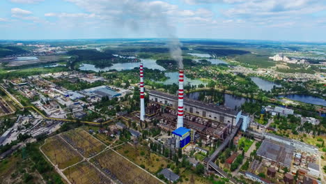 Industrial-factory-with-smokestacks-at-sunny-day.-Aerial-view-industry-zone