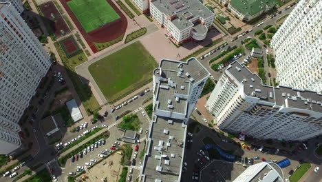 Aerial-view-infrastructure-residential-area.-School-with-sports-stadium-in-yard