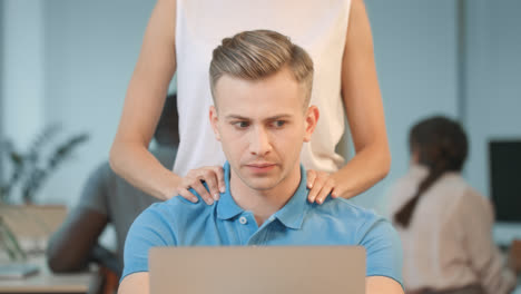Closeup-woman-hands-making-massage-to-man.-Shocked-man-asking-to-stop-harassment