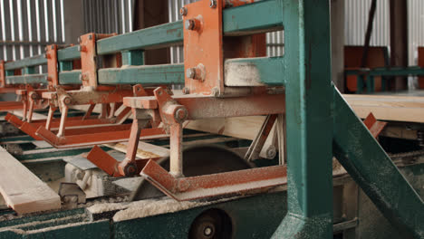 Conveyor-line-for-wood-processing.-Sawing-wood-on-boards-on-sawmill
