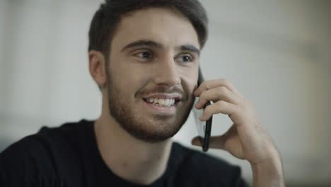 Portrait-of-young-man-talking-phone.-Closeup-of-happy-guy-face-call-mobile-phone