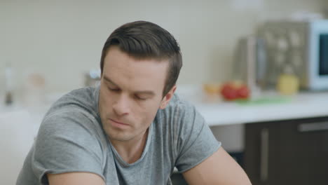 Annoyed-husband-arguing-with-wife-at-kitchen.-Closeup-angry-man-feeling-upset