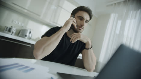 Angry-man-call-phone-at-kitchen.-Frustrated-person-talking-mobile-phone