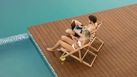 Happy-couple-using-digital-technology-on-relax.