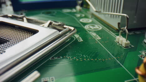 Computer-circuit-board.-Dolly-shot-of-computer-motherboard-with-resistors
