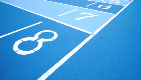 Sporting-running-tracks-in-blue-colors-with-diferent-numbers.-Numbers-of-lanes