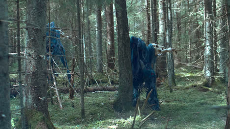 Mysterious-monsters-with-long-legs-running-around-forest.-Fantastic-beasts