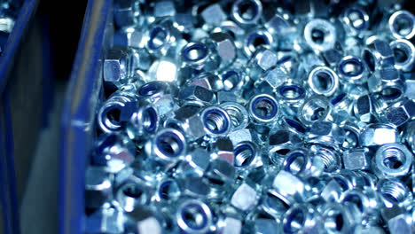 Shiny-nuts-for-industrial-needs.-Manufacture-of-metal-products
