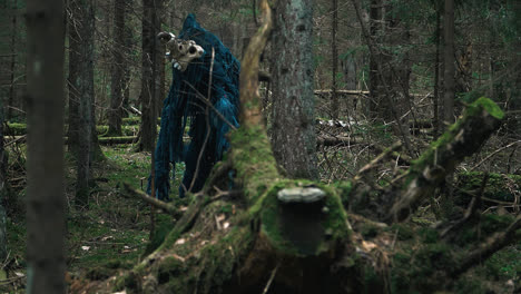 Horrible-creature-standing-among-trees-in-forest.-Terrible-monster