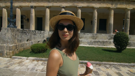 Tourist-woman-walking-at-ancient-city-at-sunny-day.-Woman-traveling-at-vacation