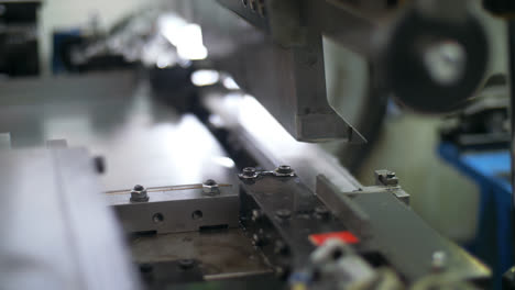 Forming-metal-detail-on-metalworking-machinery.-Close-up-processing-metal-detail