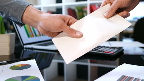 Transfer-envelope-with-money-from-hand-to-hand.-Business-transaction-money