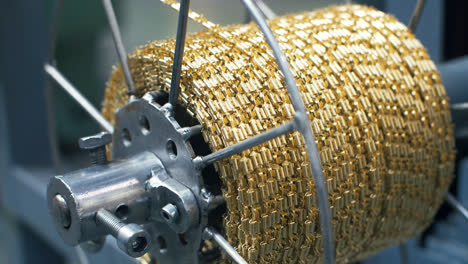 Process-winding-metal-chain-on-coil-at-manufacturing-factory.-Metal-working