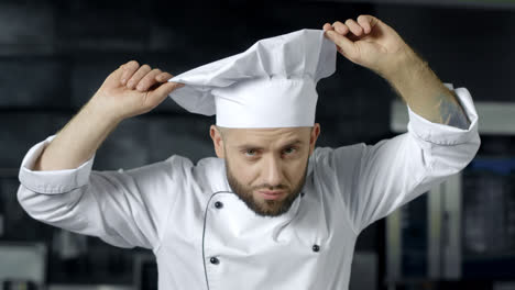 Chef-man-preparing-to-cook-at-kitchen-restaurant.-Portrait-of-serious-male-chef.