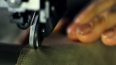 Sewing-process-of-the-leather-shoes.-Close-up-man-hands-behind-sewing