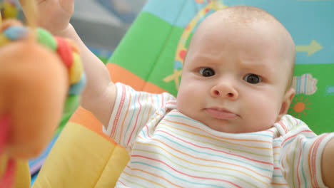 Angry-baby-face.-Portrait-of-cute-infant-emotion.-Funny-childhood.-Cheerful-kid