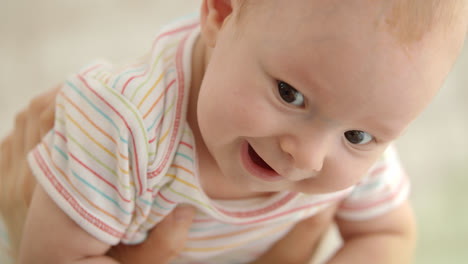 Cute-baby-face.-Close-up-of-funny-baby-emotion.-Portrait-of-happy-child-face