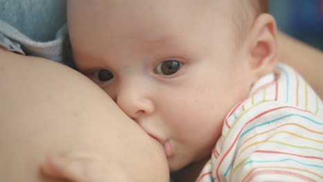 Breastfeeding-baby-face.-Lovely-infant-eating-mother-milk.-Sweet-motherhood