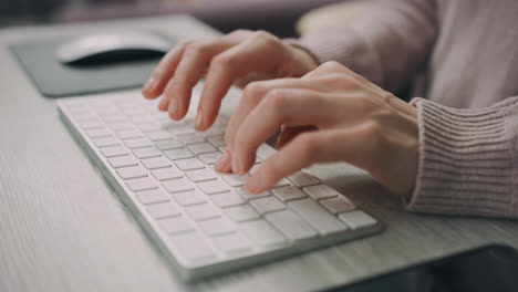 Female-hands-typing-on-modern-keyboard.-Freelance-worker-typing-keyboard