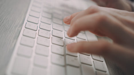 Hands-typing-on-keyboard.-Close-up-of-female-hands-typing-keyboard-buttons