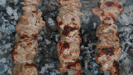 Grilling-meat-bbq-on-smoking-charcoal.-Close-up-meat-barbecue-on-charcoal-grill