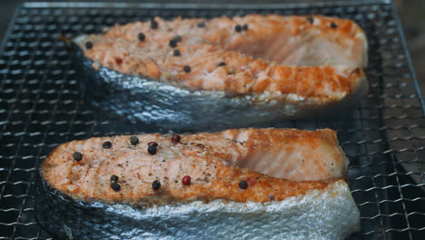 Salmon-bbq-with-spice-grilling-on-charcoal-grill.-Close-up-cooking-fish-barbecue
