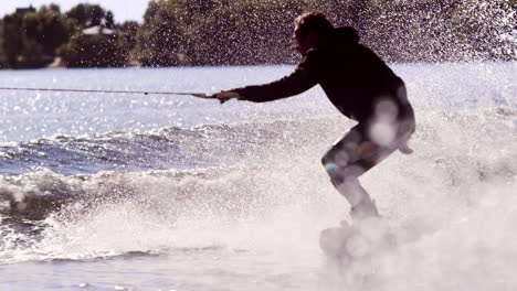 Wake-board-rider-jumping-on-river-waves.-Extreme-lifestyle
