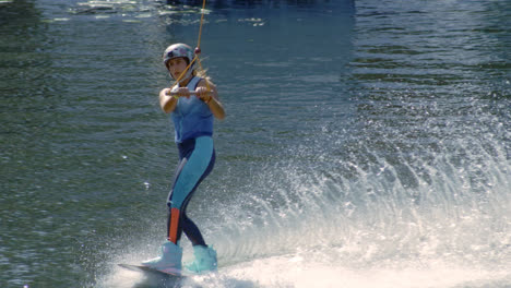 Slim-girl-waterskiing-during-her-vacations.-Extreme-water-sports
