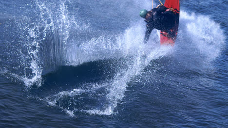 Extreme-man-studying-riding-wakeboarding-stunt-on-water.-Extreme-water-sports