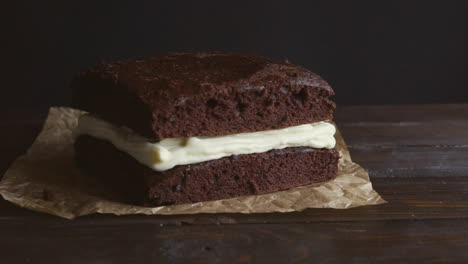 Chef-making-chocolate-cream.-Close-up-of-chef-put-cake-layer-on-cream